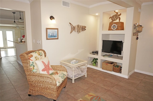 living area featuring tile patterned flooring, ornamental molding, and french doors