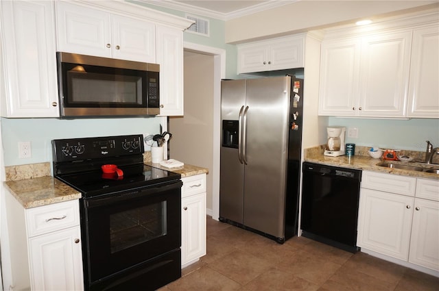 kitchen with sink, black appliances, and white cabinets