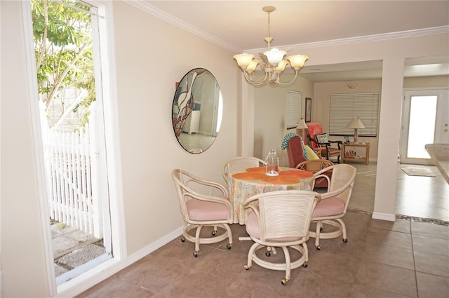 dining room featuring tile patterned flooring, crown molding, a wealth of natural light, and a chandelier