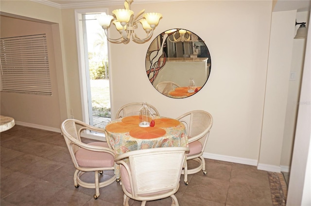 dining area with ornamental molding and an inviting chandelier