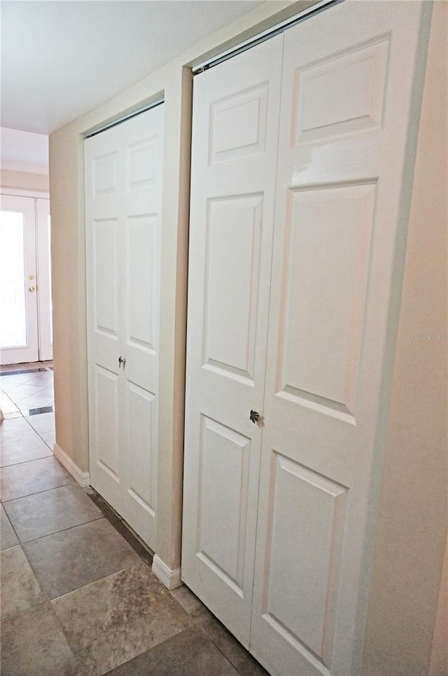 corridor featuring french doors