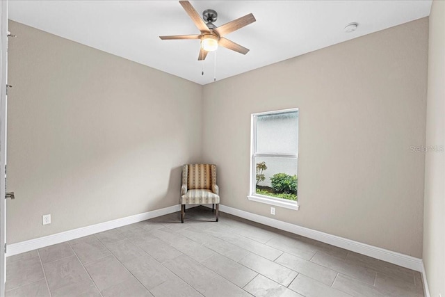 unfurnished room featuring ceiling fan