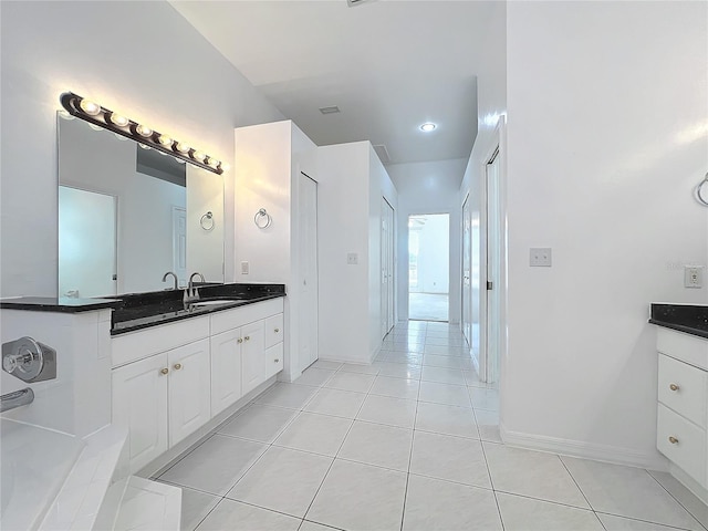 bathroom featuring vanity and tile patterned flooring