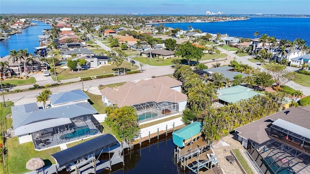 bird's eye view with a water view