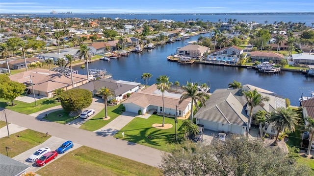 bird's eye view with a water view