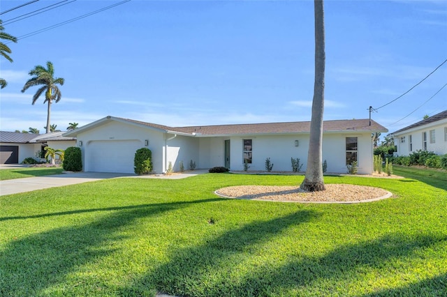 single story home featuring a garage and a front lawn