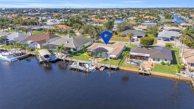 drone / aerial view with a water view