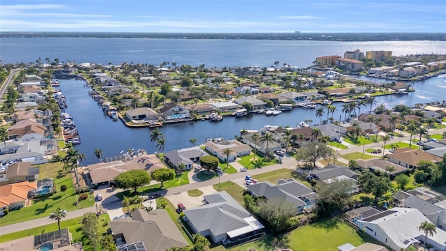 drone / aerial view with a water view