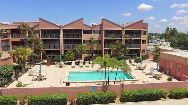 view of pool featuring a patio