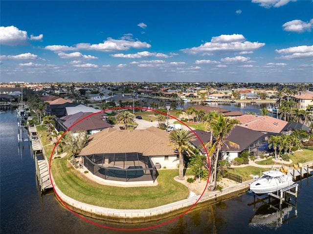 bird's eye view with a water view