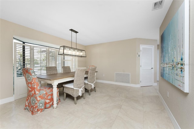 dining room featuring an inviting chandelier