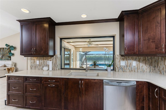 kitchen with sink, dark brown cabinets, stainless steel dishwasher, ceiling fan, and decorative backsplash