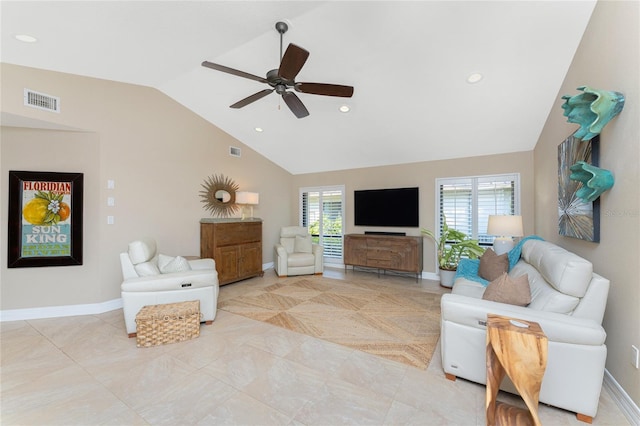 living room featuring high vaulted ceiling and ceiling fan