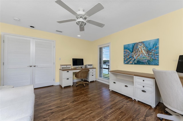 office with ceiling fan and dark hardwood / wood-style flooring