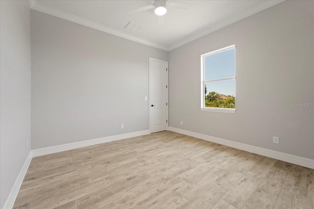 spare room with ceiling fan, ornamental molding, and light wood-type flooring