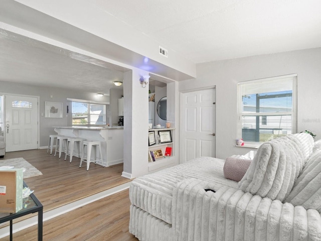 bedroom with wood-type flooring