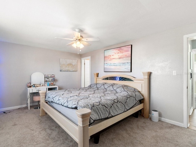 bedroom with ceiling fan and carpet