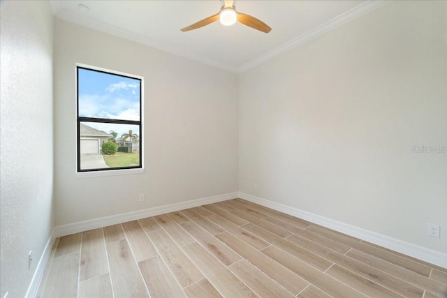 unfurnished room featuring crown molding, ceiling fan, and light wood-type flooring