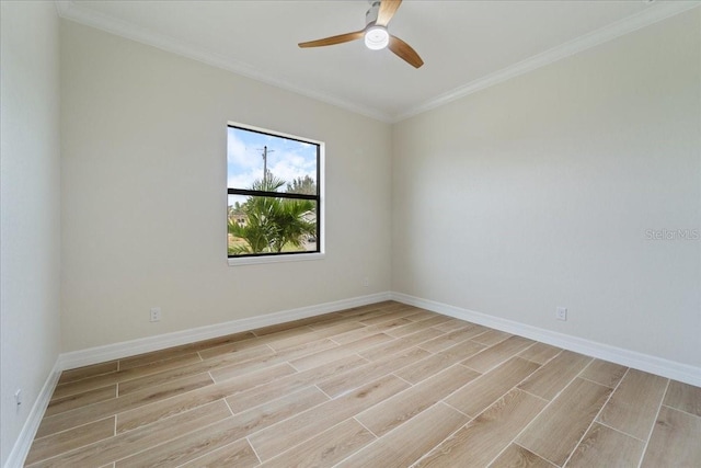 empty room with crown molding and ceiling fan