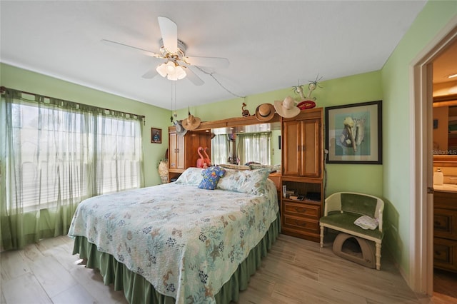 bedroom with light wood-type flooring