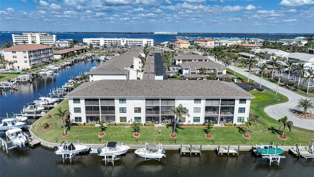 bird's eye view with a water view