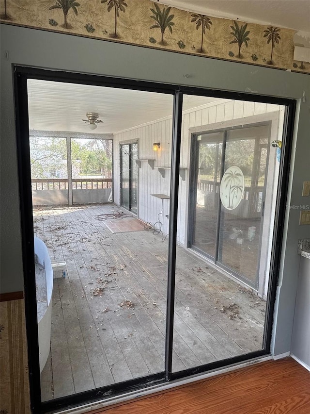 entryway with wood-type flooring