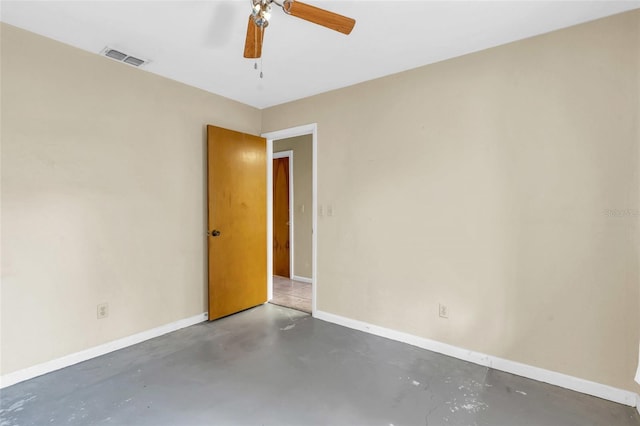 unfurnished room with ceiling fan