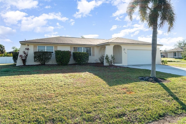 ranch-style home with a garage and a front yard