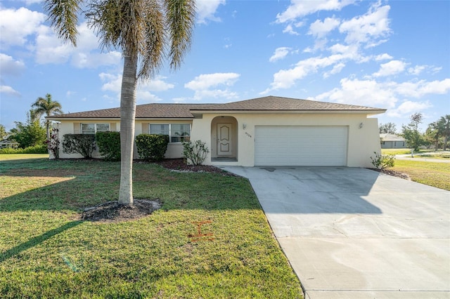 ranch-style house with a garage and a front yard