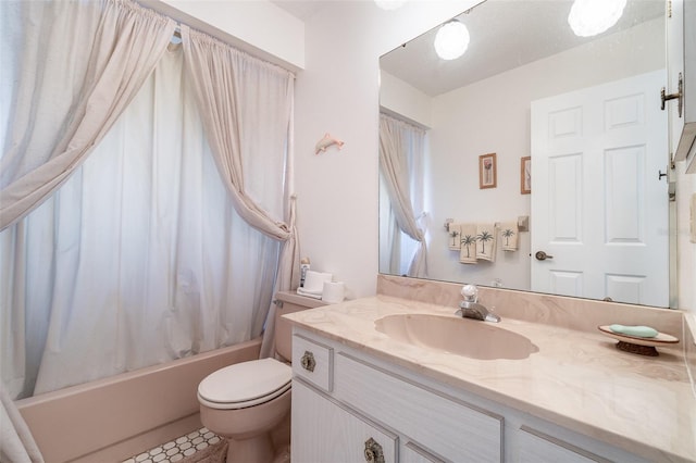 full bathroom featuring vanity, shower / tub combo with curtain, and toilet