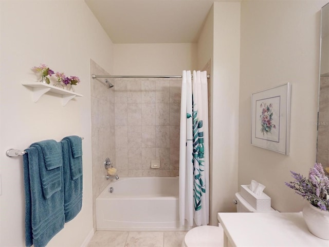 full bathroom with vanity, toilet, tile patterned flooring, and shower / bath combo with shower curtain