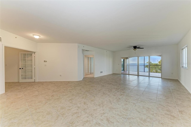 spare room with ceiling fan