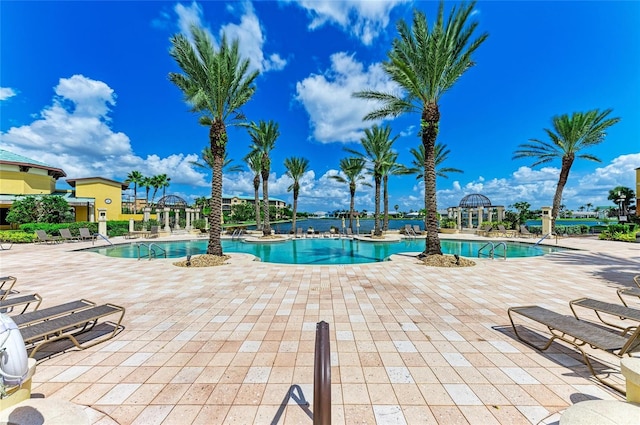 view of swimming pool featuring a patio area