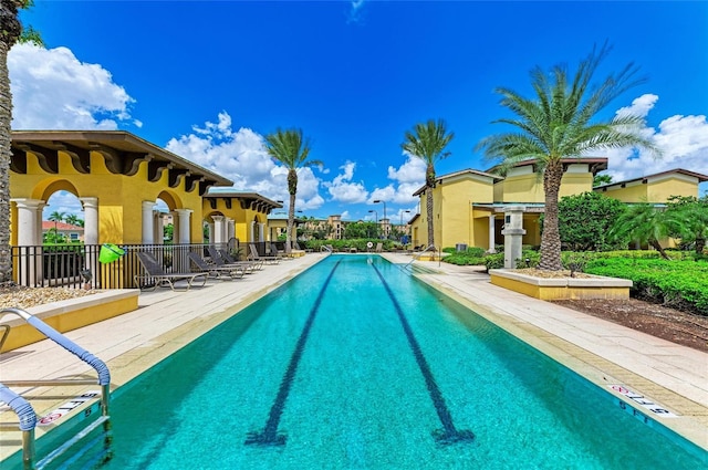 view of pool featuring a patio area