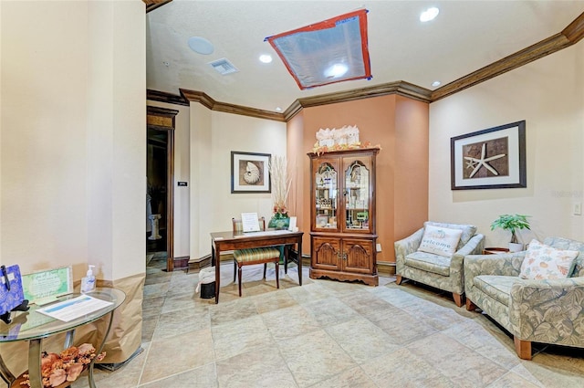 living area featuring crown molding