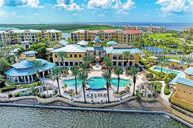 birds eye view of property featuring a water view