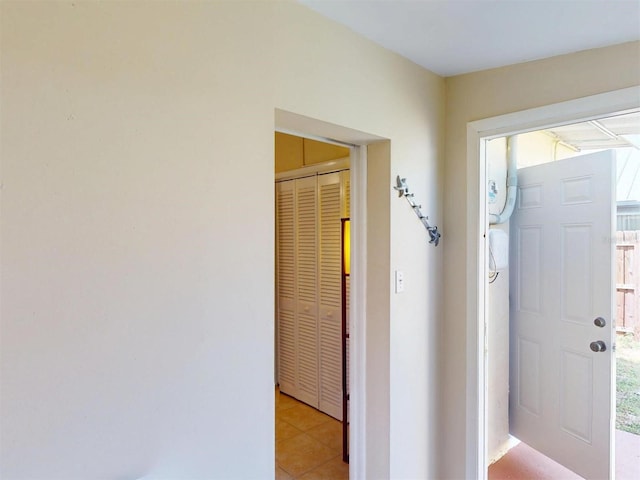 21456 Holdern Ave, Port Charlotte, FL 33952 - hall with light tile patterned floors