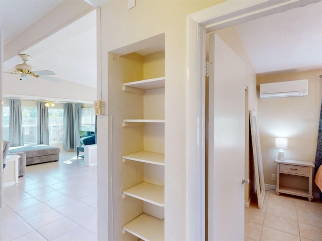 21456 Holdern Ave, Port Charlotte, FL 33952 - hall with a wall mounted air conditioner, lofted ceiling, and light tile patterned flooring