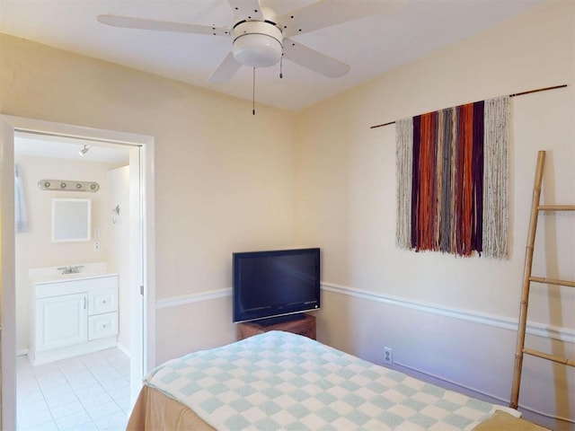 21456 Holdern Ave, Port Charlotte, FL 33952 - tiled bedroom featuring ceiling fan and sink