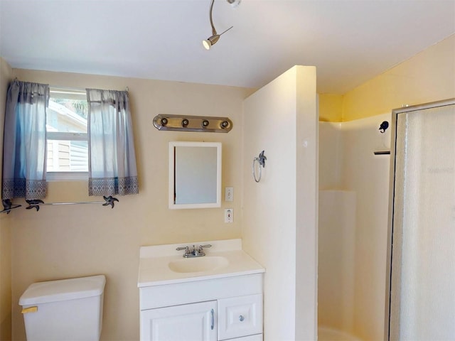 21456 Holdern Ave, Port Charlotte, FL 33952 - bathroom featuring toilet, vanity, and walk in shower