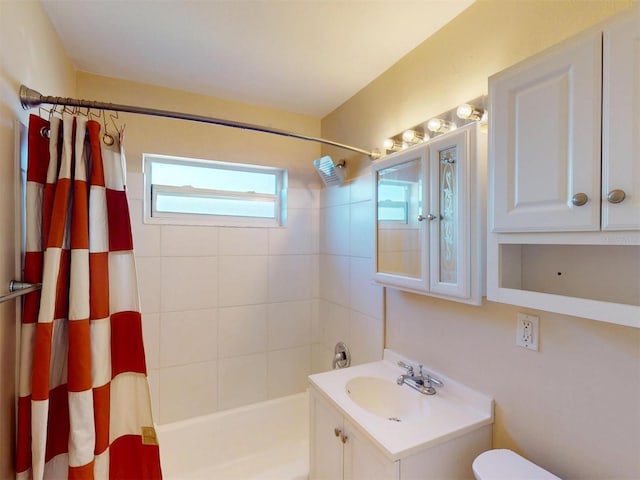 21456 Holdern Ave, Port Charlotte, FL 33952 - full bathroom with toilet, vanity, and shower / bathtub combination with curtain