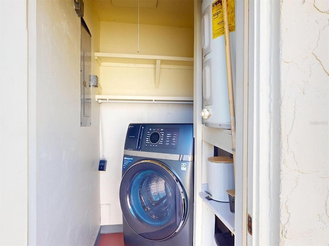 21456 Holdern Ave, Port Charlotte, FL 33952 - laundry room featuring water heater and washer / dryer