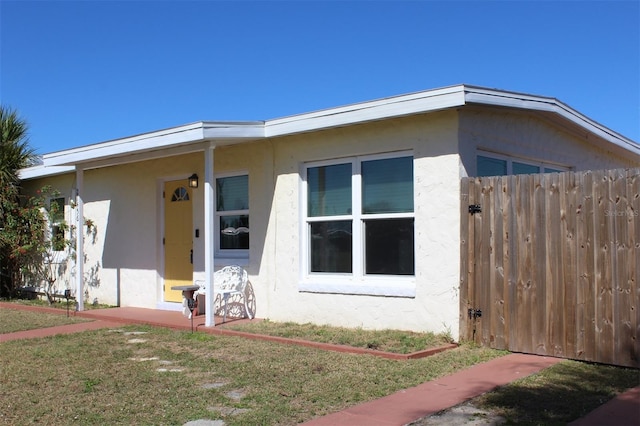 21456 Holdern Ave, Port Charlotte, FL 33952 - view of front facade with a front yard