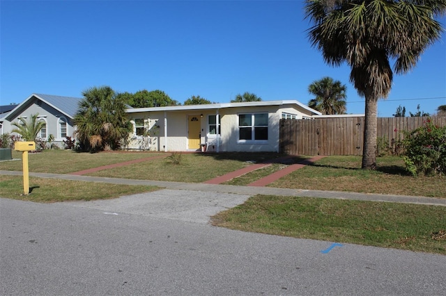 21456 Holdern Ave, Port Charlotte, FL 33952 - ranch-style house featuring a front yard