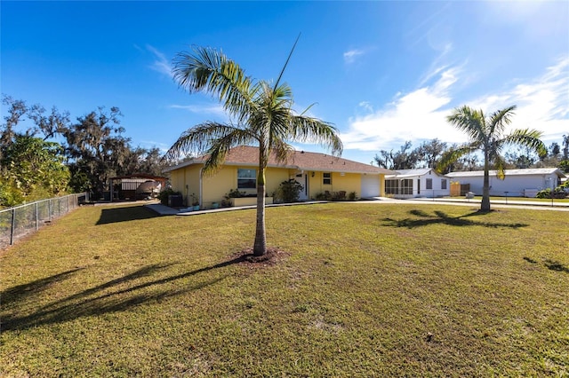 single story home featuring a front yard