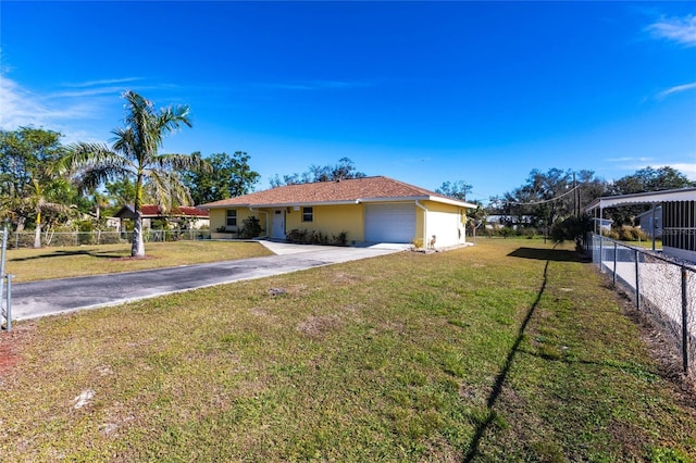 view of side of property featuring a yard and a garage