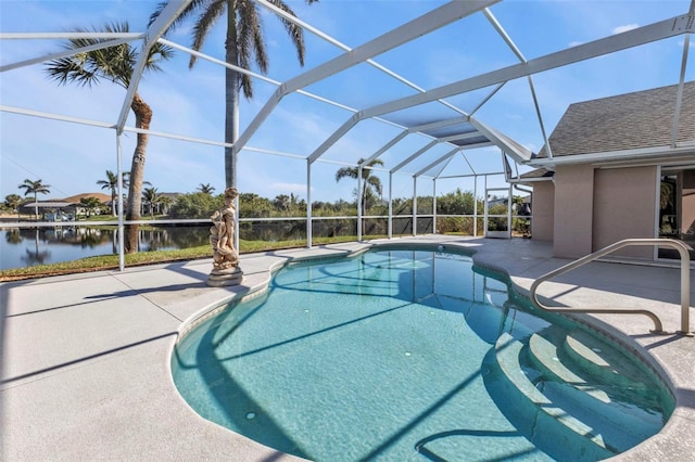 outdoor pool with a patio, a water view, and a lanai