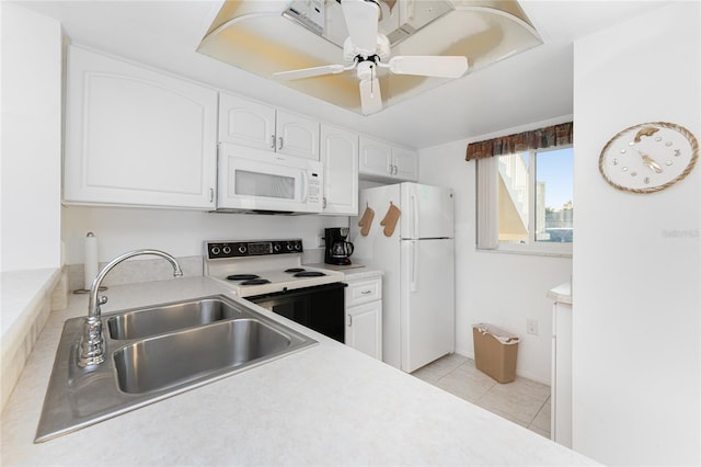 kitchen featuring light tile patterned flooring, sink, white cabinetry, ceiling fan, and white appliances