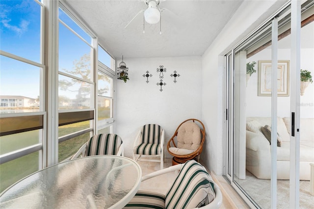 sunroom / solarium featuring a healthy amount of sunlight