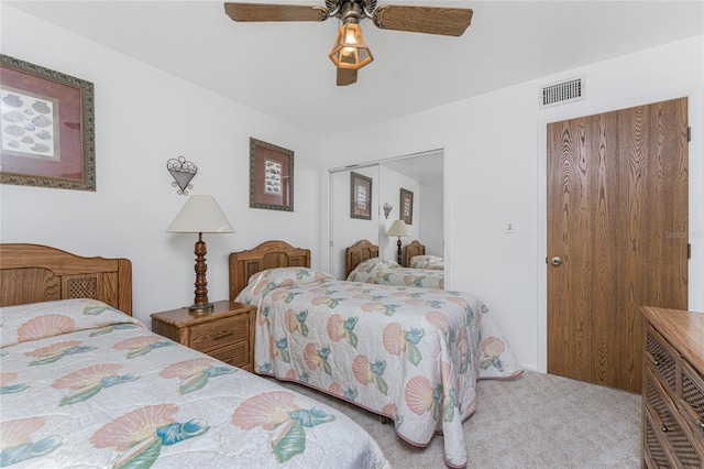 bedroom with carpet floors and ceiling fan